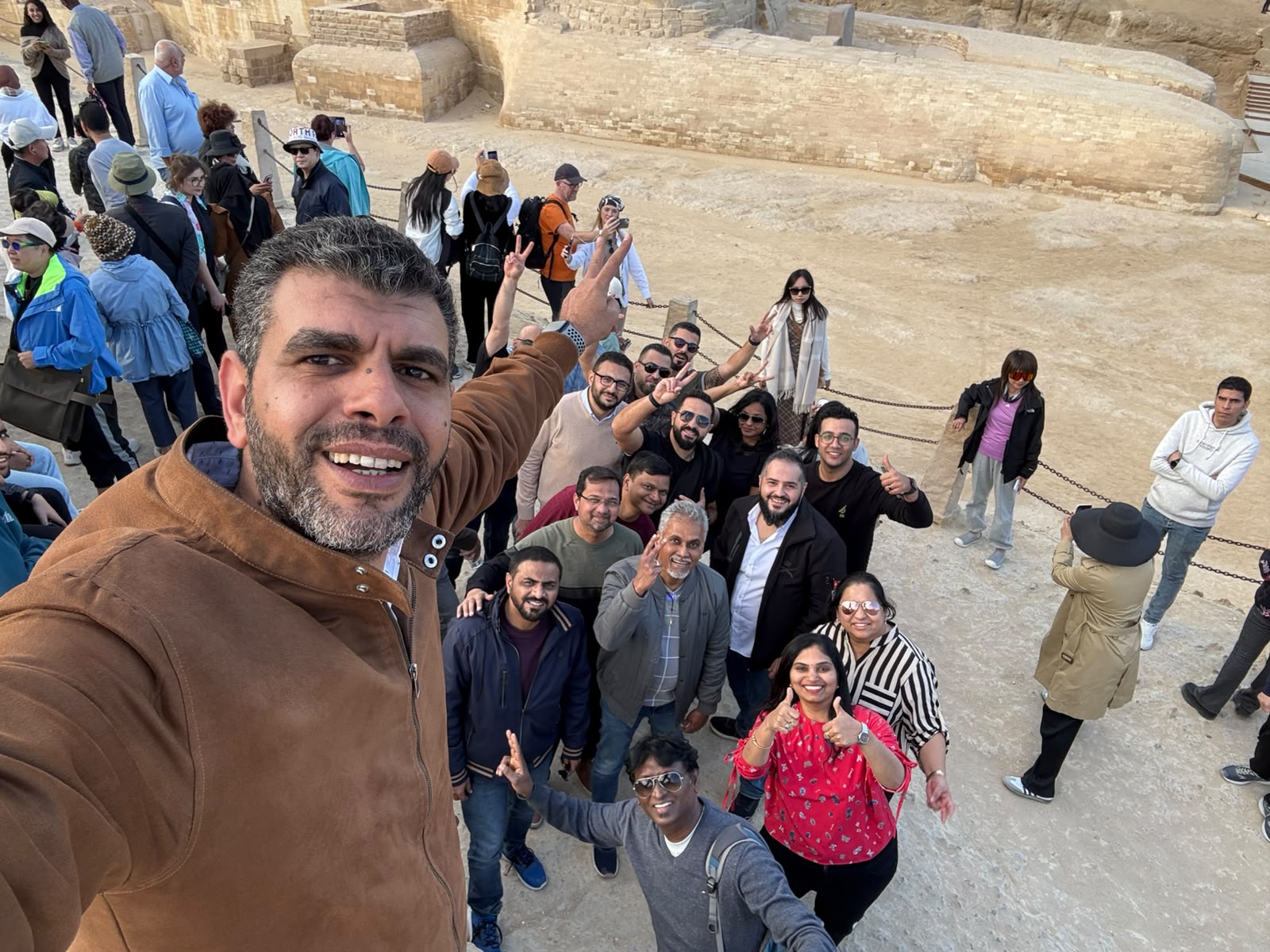 A large travel group at the Giza Pyramids